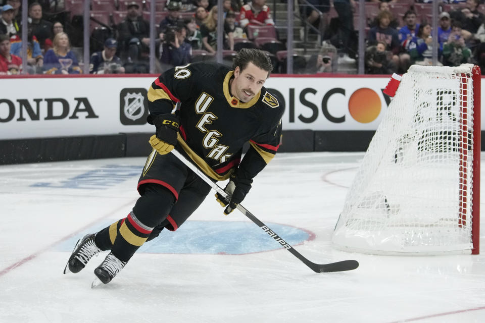 Las Vegas Golden Knights' Chandler Stephenson (20) participates in the speed skating competition during the NHL All Star Skills Showcase, Friday, Feb. 3, 2023, in Sunrise, Fla. (AP Photo/Lynne Sladky)