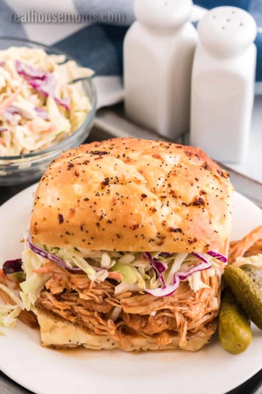 <p>Real Housemoms</p><p>Adding the honey gives this pulled chicken recipe a lovely sweet balance. </p><p><strong>Get the Recipe: <a href="https://realhousemoms.com/crockpot-honey-bbq-pulled-chicken/" rel="nofollow noopener" target="_blank" data-ylk="slk:Crockpot Honey BBQ Pulled Chicken;elm:context_link;itc:0;sec:content-canvas" class="link ">Crockpot Honey BBQ Pulled Chicken</a></strong></p>