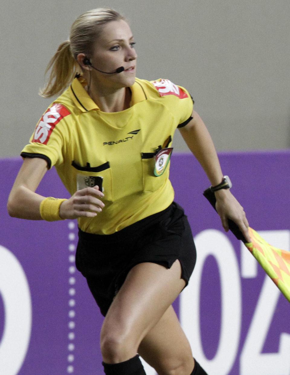 Brazil's referee assistant Uliana runs during the Brazilian championship soccer match between Atletico Mineiro and Cruzeiro in Belo Horizonte