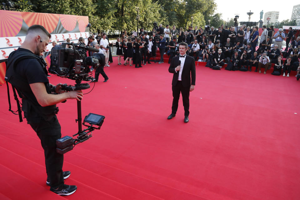 Russian actor Ivan Kudryavtsev attends the opening ceremony of the 44th Moscow International Film Festival in Moscow, Russia, Friday, Aug. 26, 2022. (AP Photo)