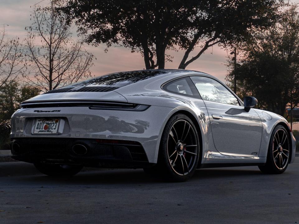 A gray Porsche 911 Carrera GTS.