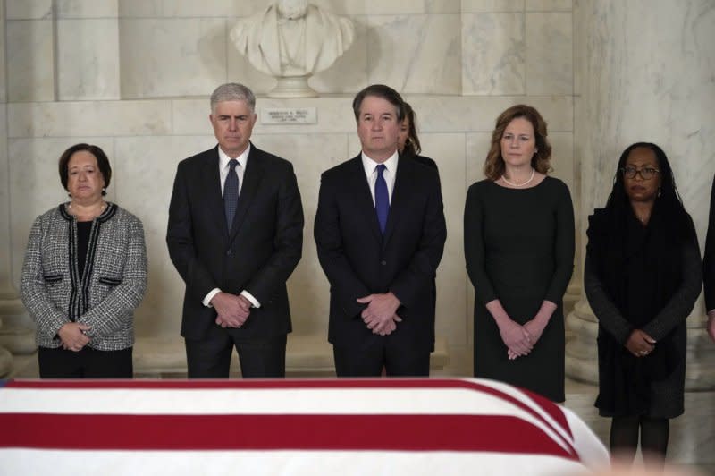 Supreme Court Justice (L to R) Elena Kagan, Justice Neil Gorsuch, Justice Brett Kavanaugh, Justice Amy Coney Barrett, and Justice Ketanji Brown Jackson attend a private ceremony for retired Supreme Court Justice Sandra Day O'Connor before public repose in the Great Hall at the Supreme Court in Washington, D.C., on Monday. Pool Photo by Jacquelyn Martin/UPI