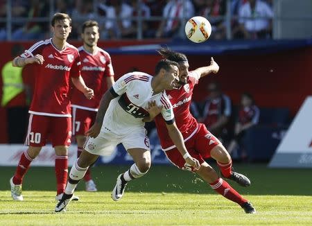 Football Soccer - FC Ingolstadt 04 v Bayern Munich - German Bundesliga - Audi Sportpark, Ingolstadt, Germany 07/05/16 Bayern Munich's Thiago Alcantara and FC Ingolstadt 04's Almog Cohen in action . REUTERS/Michaela Rehle.