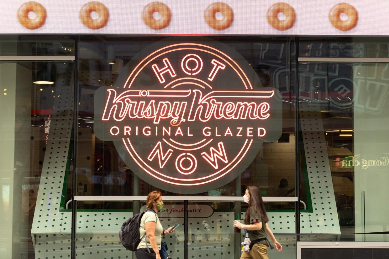 A lit Krispy Kreme hot light at the Times Square location