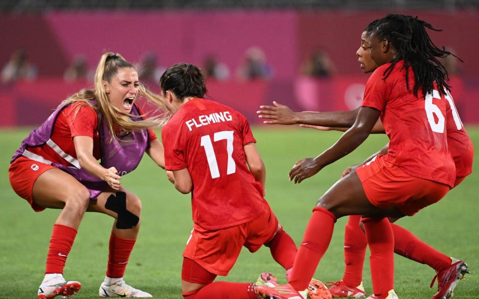 Jessie Fleming celebrates putting Canada ahead of the USA in the semi final - AFP