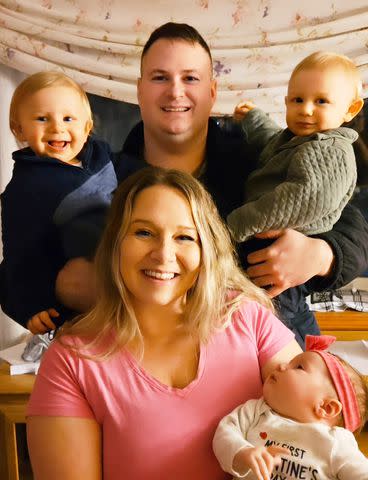 <p>Courtesy of Matthew and Alicia Jackson</p> Matthew Jackson holds twin sons Wyatt and Walker as Alicia holds daughter Everly