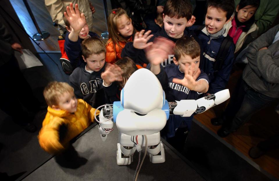 February half term Pino, a Japanese robot,  captivates children at the Science Museum in London yesterday (Thurs) as half-term crowds flocked to the 