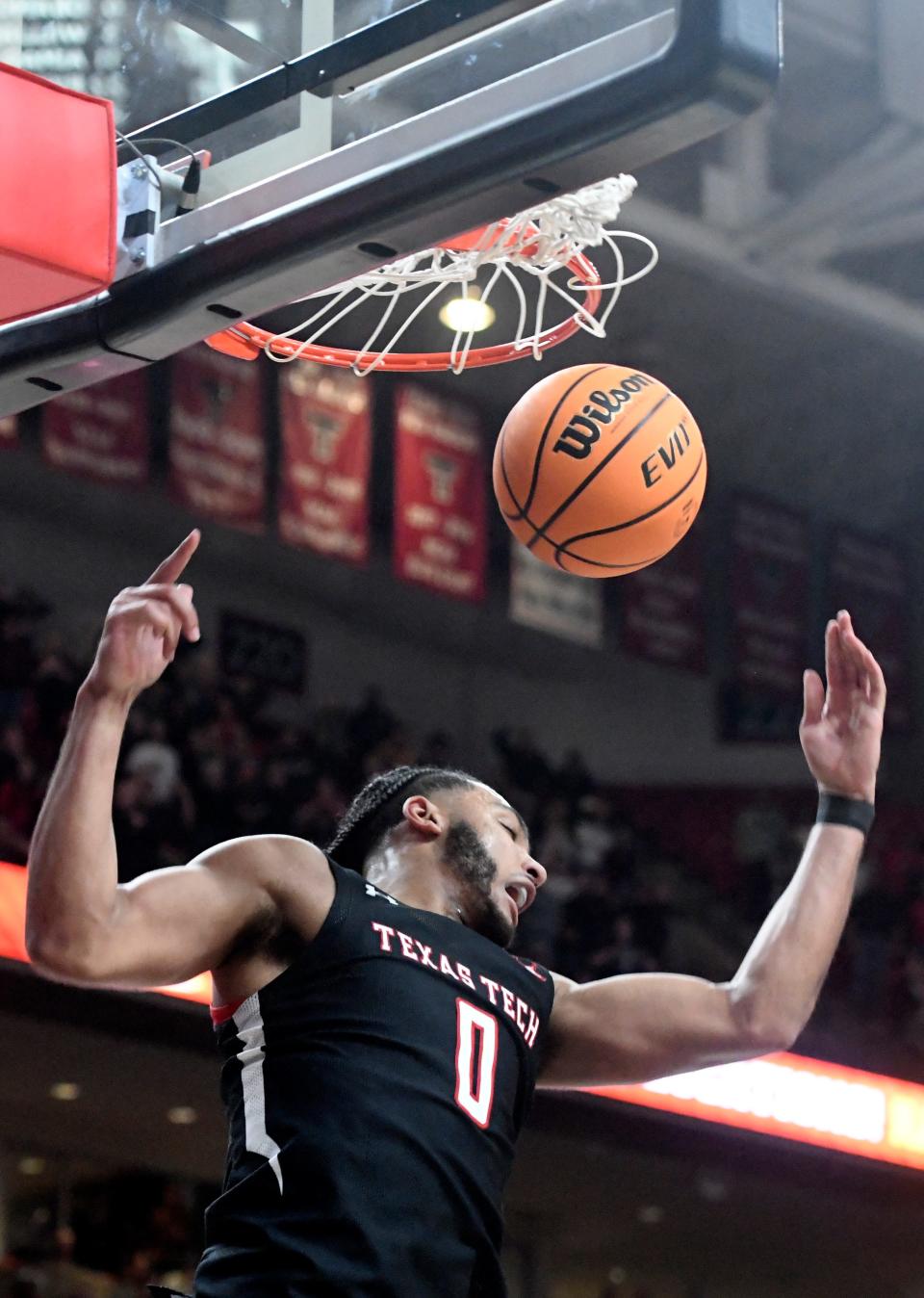Texas Tech's forward Kevin Obanor (0) dunks the ball against Texas in a Big 12 basketball game, Monday, Feb. 13, 2023, at the United Supermarkets Arena. 