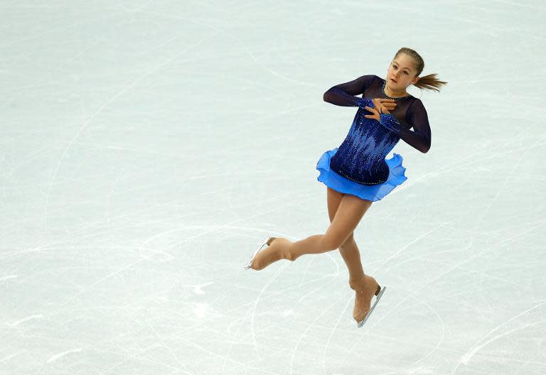 Russia's Julia Lipnitskaia performs in the Women's Figure Skating Team Short Program at the Iceberg Skating Palace during the 2014 Sochi Winter Olympics on February 8, 2014