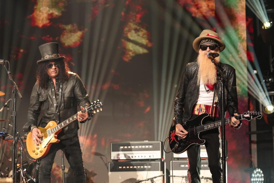 Slash and Billy Gibbons perform onstage at the 2023 CMT Music Awards held at Moody Center on April 2, 2023 in Austin, Texas.