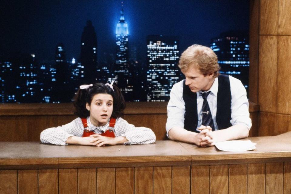 Julia Louis-Dreyfus and Brad Hall on SNL in 1983 | RM Lewis Jr./NBCU Photo Bank/NBCUniversal via Getty