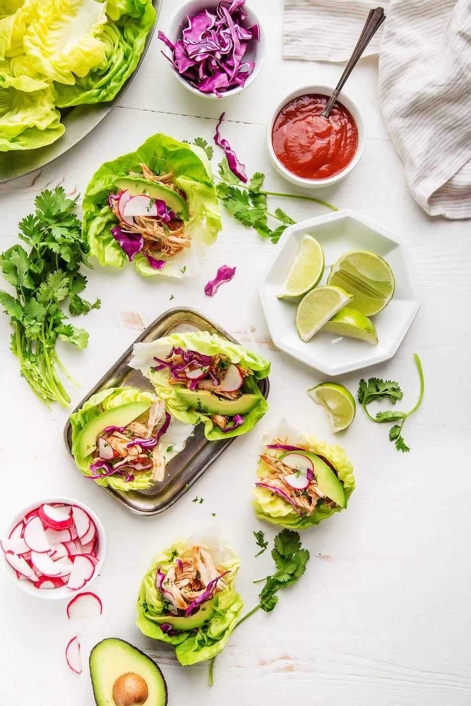 <p>Pile on the cheddar and sour cream!</p><p>Get the recipe from <a href="http://www.platingsandpairings.com/instant-pot-salsa-chicken-taco-lettuce-wraps/" rel="nofollow noopener" target="_blank" data-ylk="slk:Platings and Pairings;elm:context_link;itc:0;sec:content-canvas" class="link ">Platings and Pairings</a>.</p>