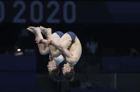 <p>TOKYO, JAPAN - JULY 26: Tom Daley and Matty Lee of Team Great Britain compete during the Men's Synchronised 10m Platform Final on day three of the Tokyo 2020 Olympic Games at Tokyo Aquatics Centre on July 26, 2021 in Tokyo, Japan. (Photo by Jean Catuffe/Getty Images)</p> 