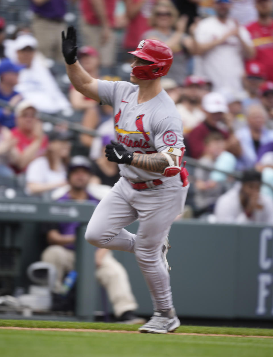 St. Louis Cardinals' Tyler O'Neill circles the basses after hitting a solo home run off Colorado Rockies starting pitcher Jose Urena in the second inning of a baseball game, Wednesday, April 12, 2023, in Denver. (AP Photo/David Zalubowski