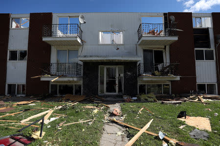 A damaged building is seen after a tornado hit the Mont-Bleu neighbourhood in Gatineau, Quebec, Canada, September 22, 2018. REUTERS/Chris Wattie