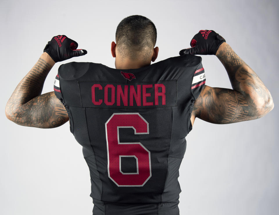 Arizona Cardinals running back <a class="link " href="https://sports.yahoo.com/nfl/players/30218" data-i13n="sec:content-canvas;subsec:anchor_text;elm:context_link" data-ylk="slk:James Conner;sec:content-canvas;subsec:anchor_text;elm:context_link;itc:0">James Conner</a> (6) poses for a photo during a photoshoot for the 2023 Arizona Cardinals Uniforms on Thursday, April 13, 2023.