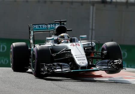 Formula One - F1 - Abu Dhabi Grand Prix - Yas Marina Circuit, Abu Dhabi, United Arab Emirates - 25/11/2016 - Mercedes' Formula One driver Lewis Hamilton of Britain drives during the first free practice. REUTERS/Hamad I Mohammed