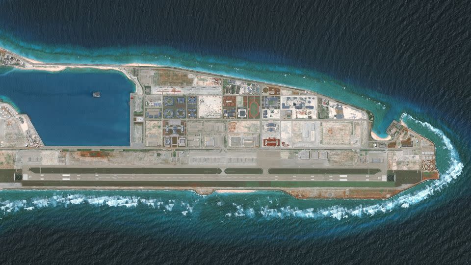 China reclaimed land on Fiery Cross Reef in the western part of the Spratly Islands group and built a runway that was completed in 2018. - DigitalGlobe/ScapeWare3d/Maxar/Getty Images
