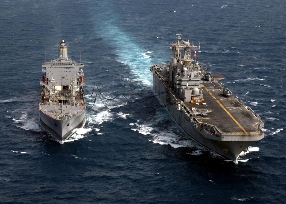 USS <em>Tarawa</em> replenishes at sea in the Persian Gulf while supporting Operation Iraqi Freedom in 2003. <em>USN</em>