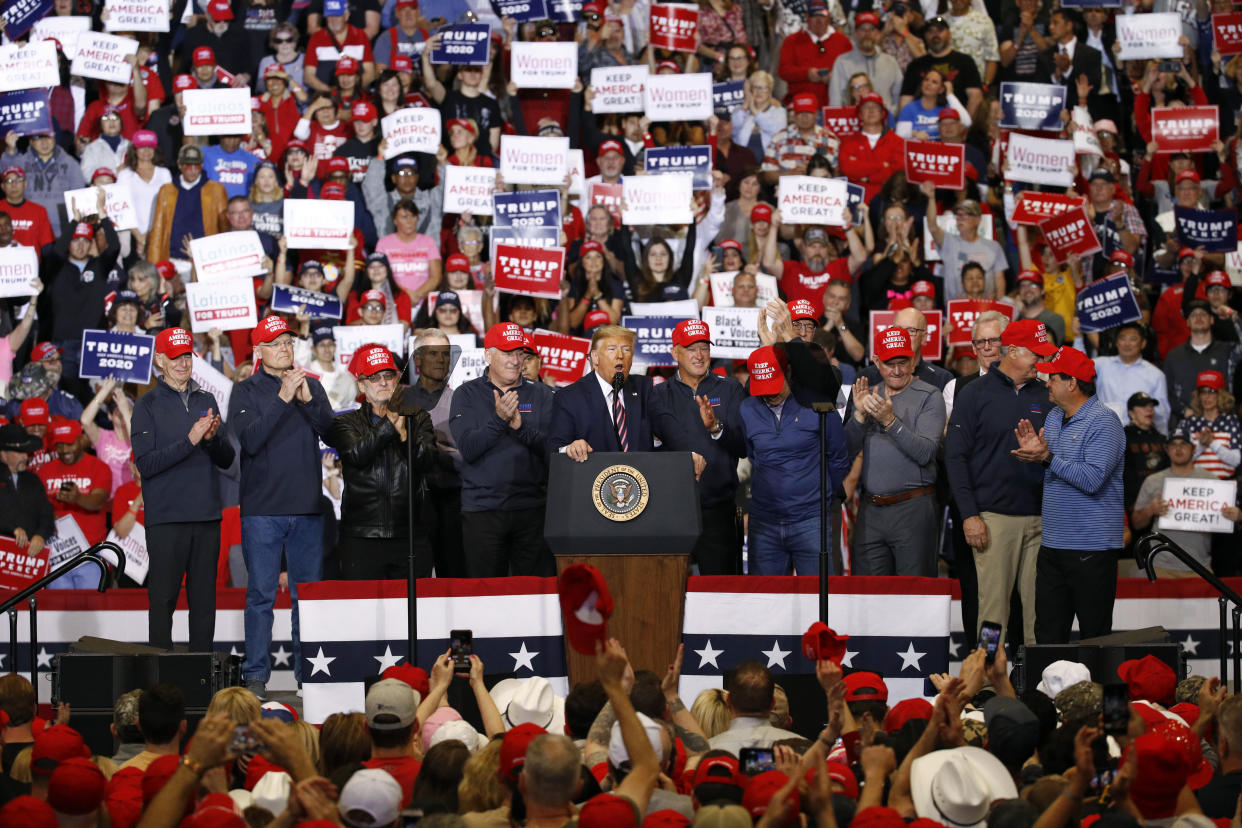 President Donald Trump speaks after bringing members of the 1980 U.S men's Olympic hockey team onstage during a campaign rally, Friday, Feb. 21, 2020, in Las Vegas. (AP Photo/Patrick Semansky)