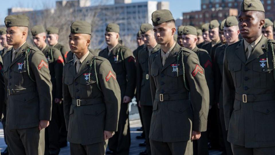 Marines from 1st Battalion, 8th Marine Regiment, stand at attention during a naturalization ceremony aboard the USS North Carolina on Dec. 2, 2022. (Cpl. Timothy Fowler/Marine Corps)