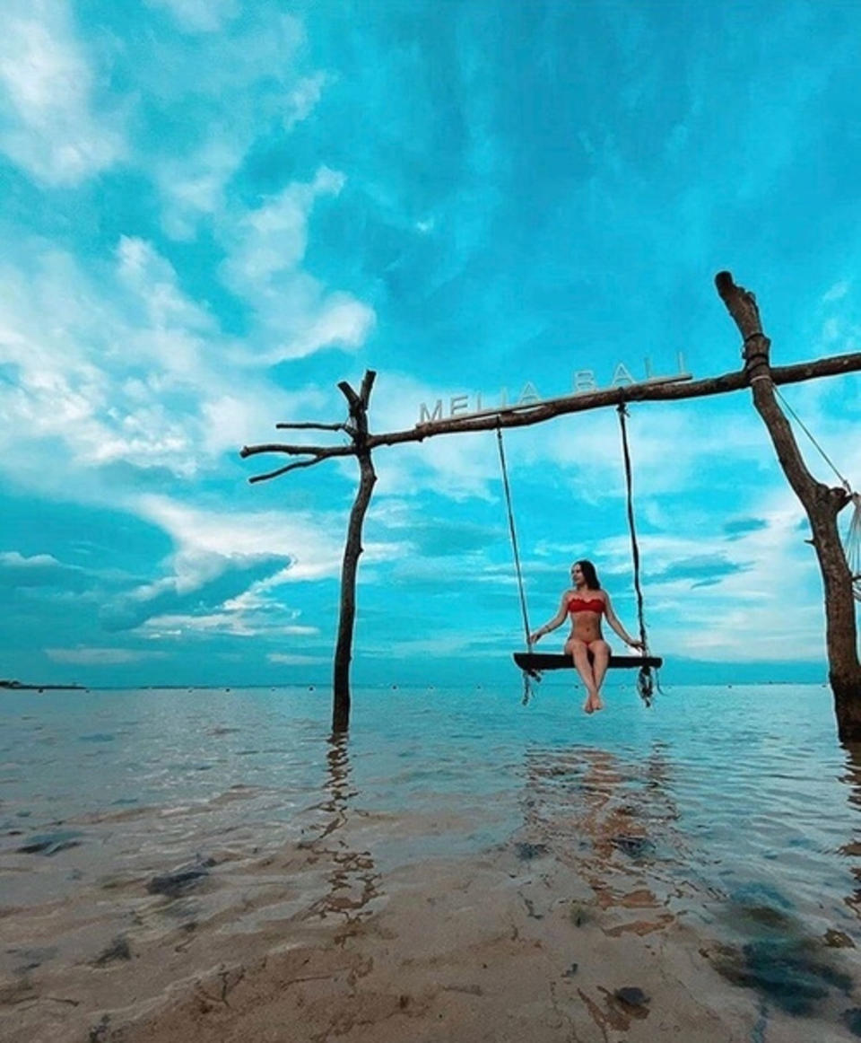 Avelina Nazarova, pictured on a swing, was said to be a strong swimmer but her strength proved no match for the current at Pasut Beach. Source: CEN/australscope