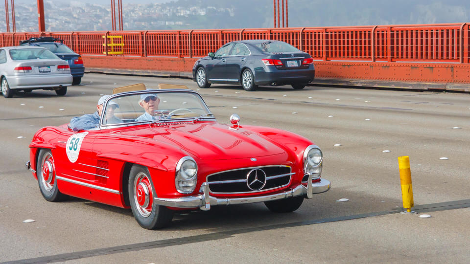 SAN FRANCISCO - APRIL 30: A 1958 Mercedes Benz 300SL Roadster is being driven on Golden Gate Bridge during the 2012 California Mille race in San Francisco on April 30, 2012.