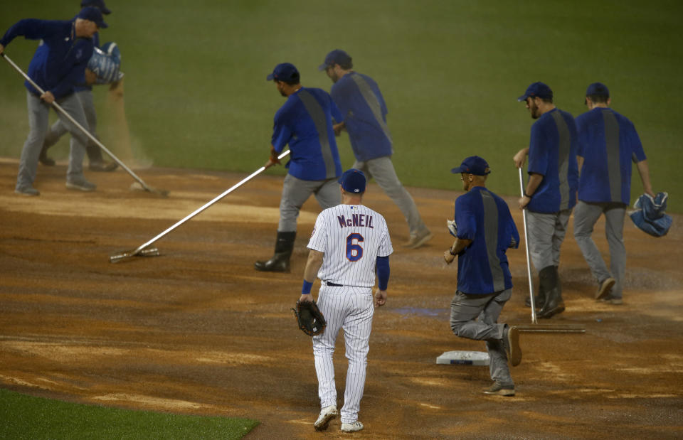 NEW YORK, NEW YORK - JUNE 13:  Jeff McNeil #6 of the New York Mets looks on as the grounds crew work on the field prior to the start of the ninth inning against the St. Louis Cardinals at Citi Field on June 13, 2019 in New York City. (Photo by Jim McIsaac/Getty Images)