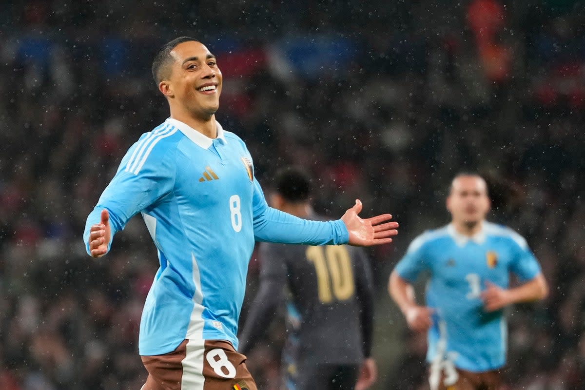 Youri Tielemans is seen wearing Belgium’s new away kit as he celebrates the opening goal at Wembley (AP)