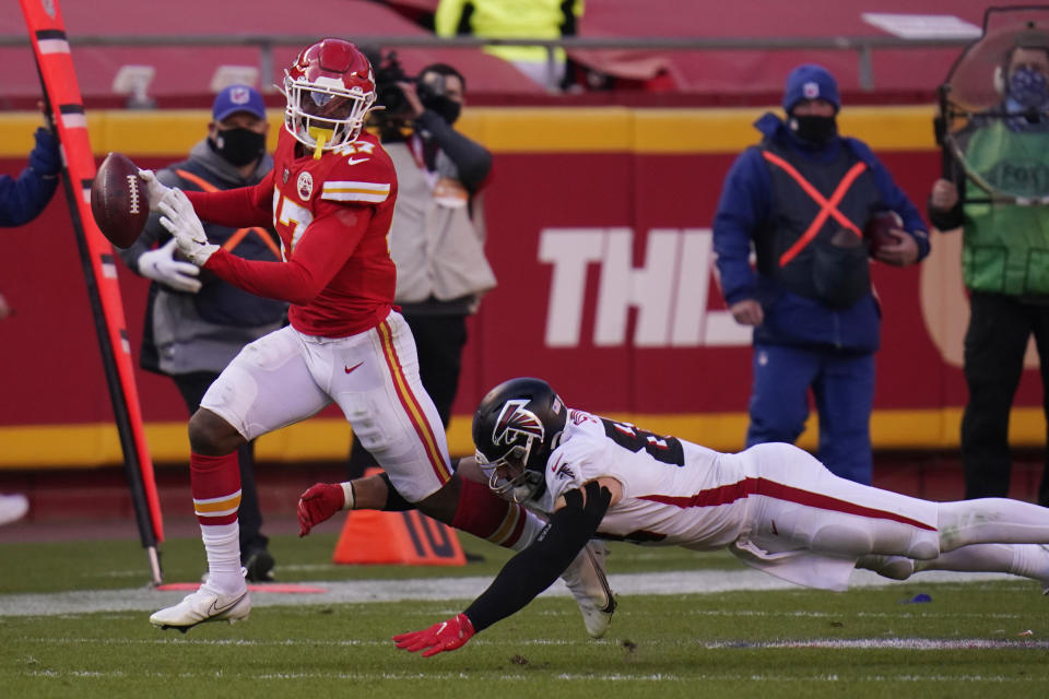 Atlanta Falcons Luke Stocker dives to tackle Kansas City Chiefs linebacker Darius Harris (47) after he recovered a fumble by Falcons Brandon Powell during the second half of an NFL football game, Sunday, Dec. 27, 2020, in Kansas City. (AP Photo/Jeff Roberson)