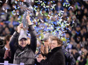 FILE PHOTO: Seattle Seahawks owner Paul Allen celebrates with the Vince Lombardi Trophy after winning Super Bowl XLVIII against the Denver Broncos at MetLife Stadium in East Rutherford, New Jersey, U.S., February 2, 2014. Mandatory Credit: Robert Deutsch/File Photo