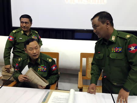 Major General Tun Tun Nyi and Brigadier General Zaw Min Tun report to the press about the recent Arakan army conflict and the peace process, at the Defense Services Museum in Naypyidaw, Myanmar, January 18, 2019. REUTERS/Shoon Naing NO RESALES. NO ARCHIVES.