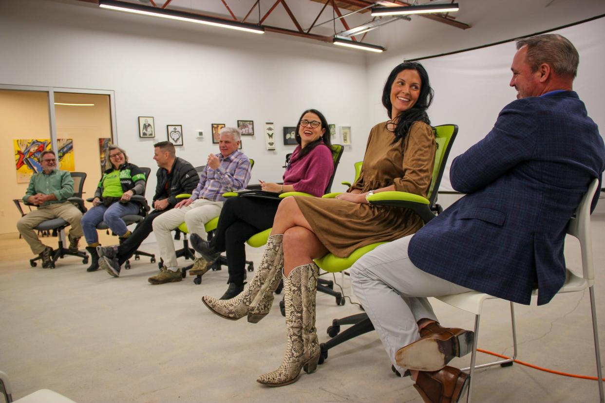 From left, Mike Labossiere, Sarah Labossiere, John Tomawski, Tom Richardson, Patti Rego, Nicole Lund and Mike Lund speak about tourism in Fall River at the Fall River Arts and Culture Coalition Ignition Space, 44 Troy St., on Wednesday, Jan. 24.