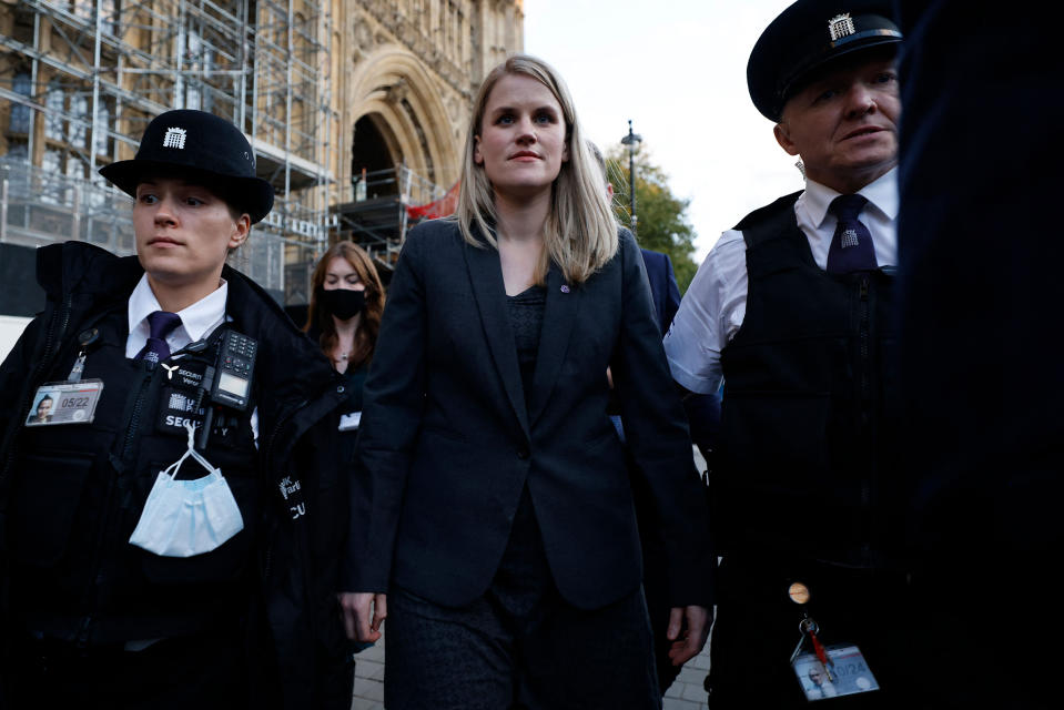 Facebook whistleblower Frances Haugen (center) leaves the Houses of Parliament