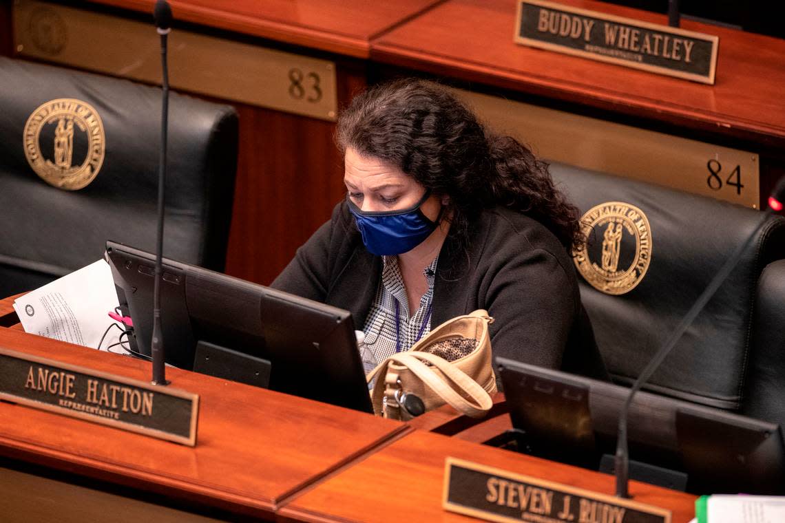 Kentucky state Rep. Angie Hatton, D-Whitesburg, sits at her desk during a recess on the second day of the 2021 legislative session at the Kentucky state Capitol in Frankfort, Ky., Wednesday, Jan. 6, 2021.