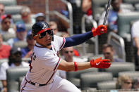 Atlanta Braves catcher William Contreras (24) follows through on a base hit in the second inning of a baseball game against the Washington Nationals Thursday, June 3, 2021, in Atlanta. (AP Photo/John Bazemore)