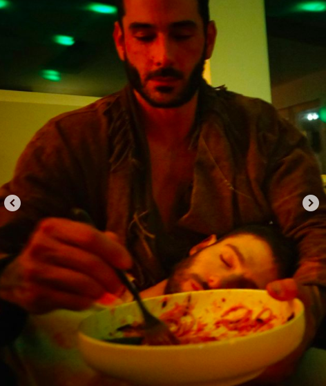 Landon and Julian eating out of a bowl