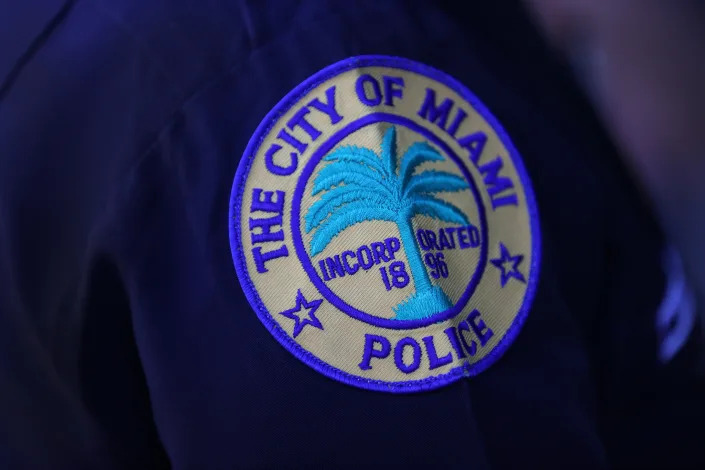 A close-up of a patch on a police officer's uniform.