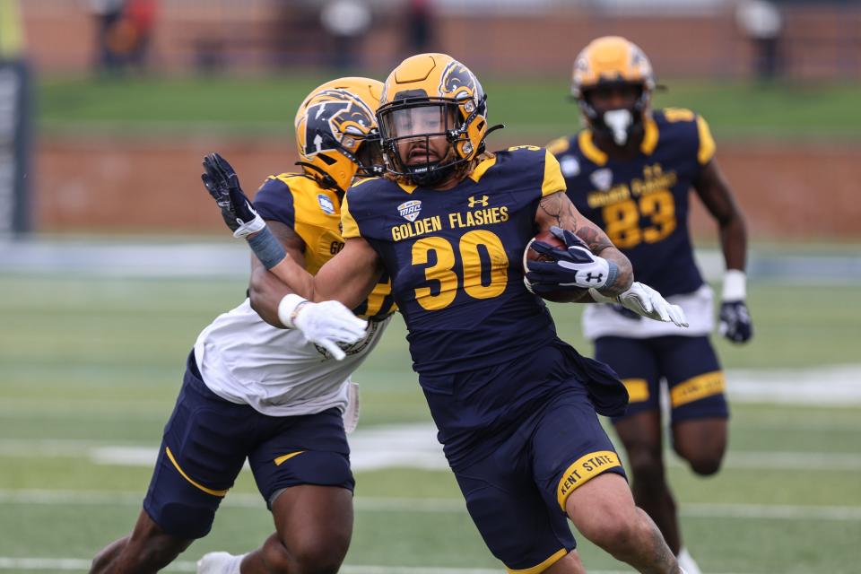 Running back Ky Thomas runs the ball at Kent State's spring game Saturday, April 29, 2023, at Dix Stadium in Kent, Ohio.