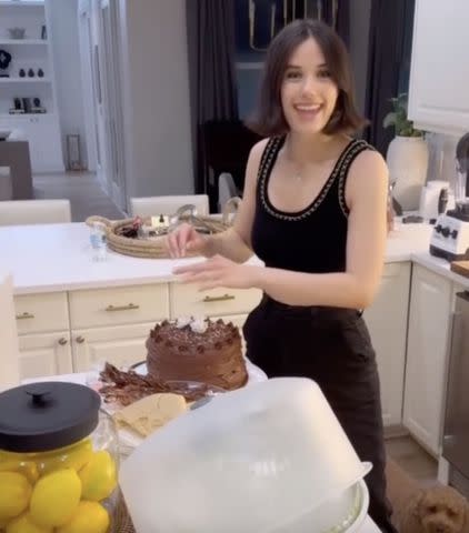 <p>John Travolta/Instagram</p> Ella Travolta decorating a birthday cake on April 3, 2024