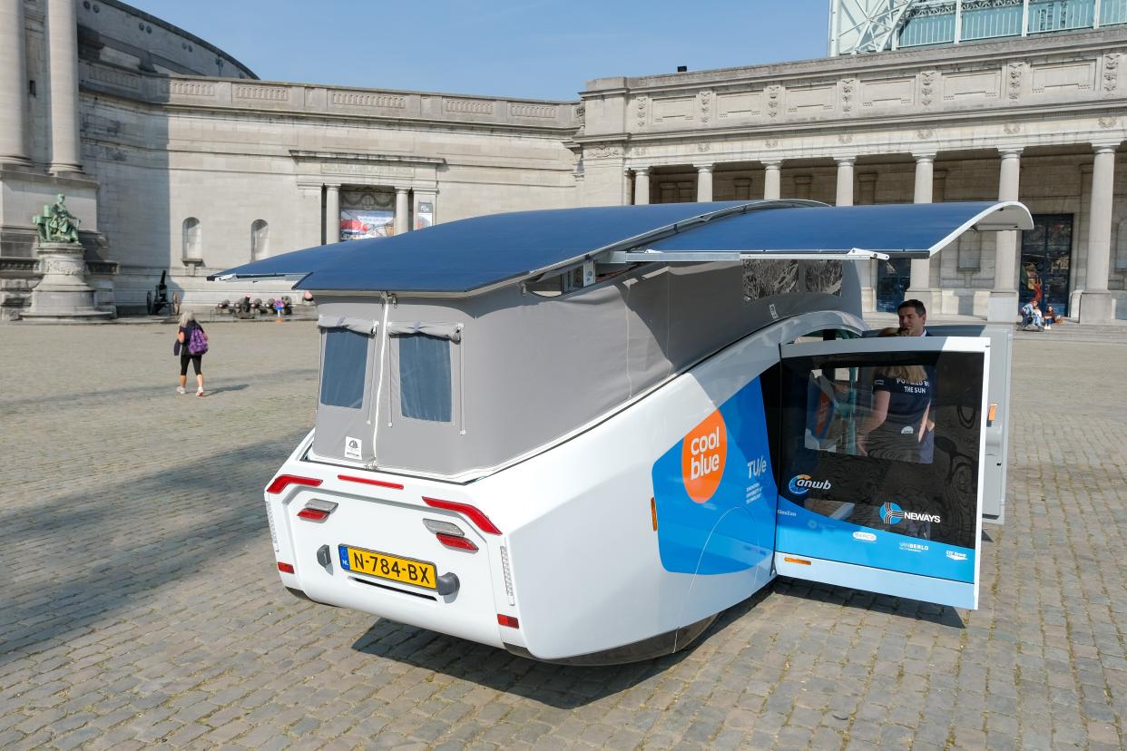 Photo taken on Sept. 20, 2021 shows Stella Vita, a solar-powered recreational vehicle, in Brussels, Belgium.  Designed by the solar team of Eindhoven University of Technology, Stella Vita is equipped with solar panels on the roof, through which the vehicle generates enough energy to drive, shower, watch TV, charge, etc. By using energy efficiently, Stella Vita can travel up to 730 km on a sunny day. (Photo by Zhang Cheng/Xinhua via Getty Images)