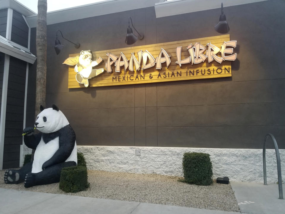 Panda Libre, an Asian-Mexican fusion restaurant, in Gilbert, Ariz., is pictured on Thursday, Feb. 27, 2020. When picking a name for their Asian-Mexican fusion restaurant in suburban Phoenix, Paul and Nicole Fan settled on “Panda Libre,” hoping the mix of China's iconic bear and the Spanish word for “free" would signal to customers the type of cuisine it offered. That decision could cost them dearly. Chinese takeout chain Panda Express sued them in federal court last month alleging trademark infringement. (AP Photo/Terry Tang)