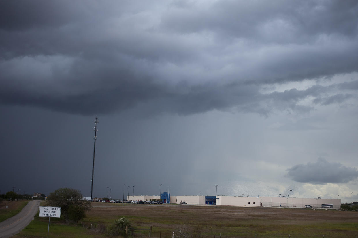 A storm comes in over the Karnes County Residential Center in South Texas, where some migrant women have been held for months. (Photo: Dominic Bracco II/Prime for The Washington Post via Getty Images)