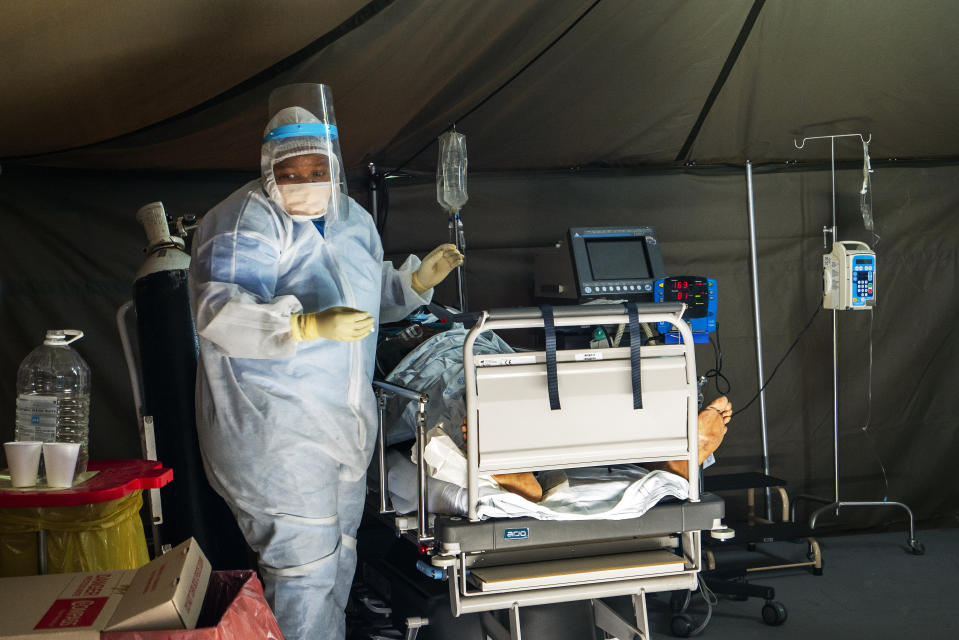 Covid-19 patients are being treated at the Tshwane District Hospital in Pretoria, South Africa, Friday July 10, 2020. Health Minister Zweli Mkhize this week said South Africa could run out of available hospital beds within the month. "The storm that we have consistently warned South Africans about is now arriving," he told lawmakers. The African continent overall has over 523,000 confirmed virus cases after passing the half-million milestone on Wednesday. But shortages in testing materials mean the true number is unknown.(AP Photo/Jerome Delay)