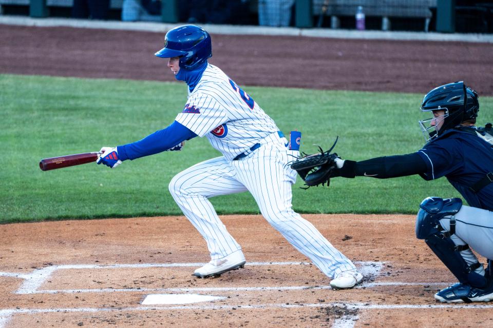 Iowa Cubs player Pete Crow-Armstrong bunts during Tuesday's game against the Toledo Mud Hens at Principal Park in Des Moines.
