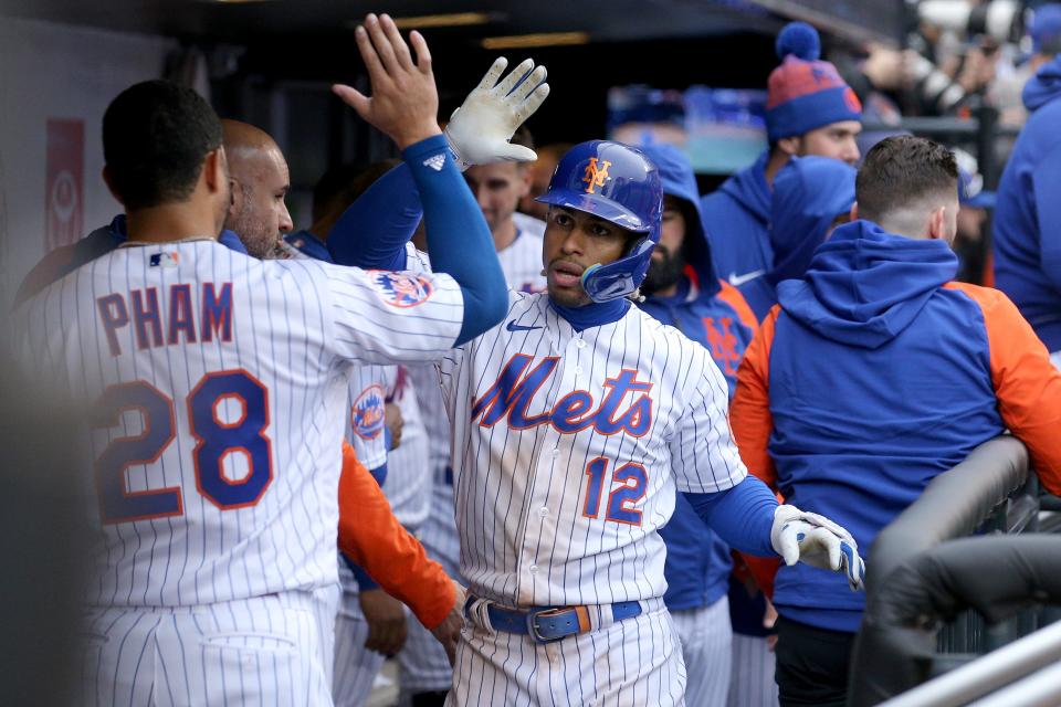 Apr 7, 2023; New York City, New York, USA; New York Mets shortstop Francisco Lindor (12) celebrates his two run home run against the Miami Marlins with center fielder Tommy Pham (28) during the eighth inning at Citi Field. Mandatory Credit: Brad Penner-USA TODAY Sports