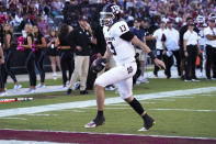 Texas A&M quarterback Haynes King (13) scores on a four-yard touchdown run during the second half of an NCAA college football game against Mississippi State in Starkville, Miss., Saturday, Oct. 1, 2022. (AP Photo/Rogelio V. Solis)