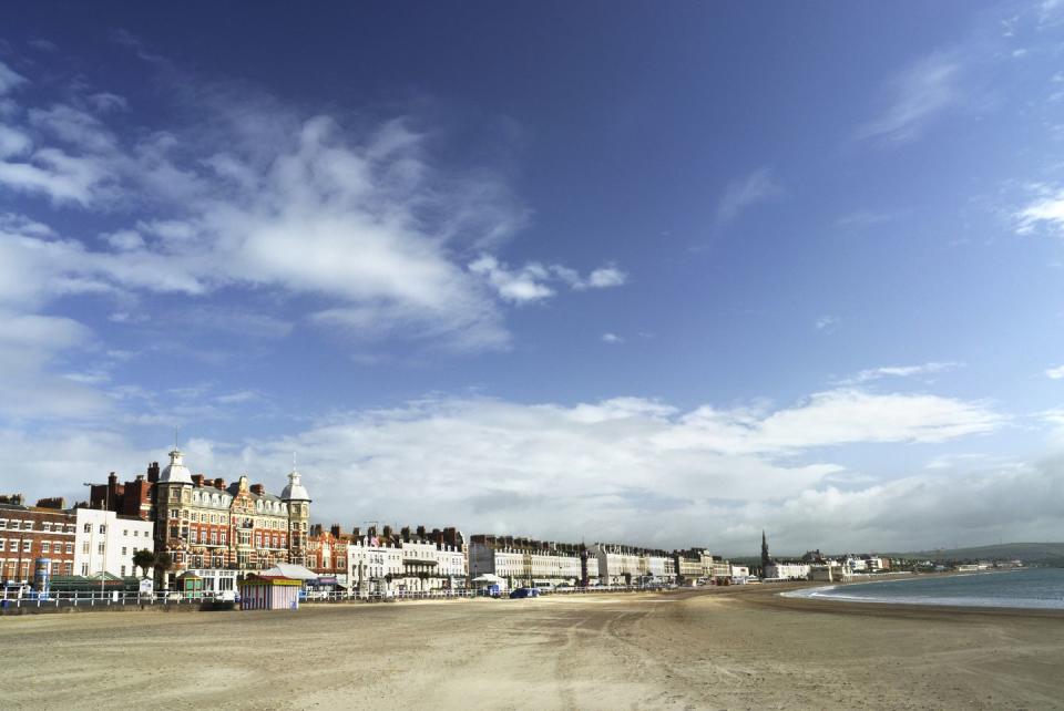 <p>The gentle curving arc of sand in Weymouth Bay is a popular destination for swimming and sunbathing, overlooked by a magnificent Georgian seafronted row of buildings.<br></p><p><a class="link " href="https://www.booking.com/" rel="nofollow noopener" target="_blank" data-ylk="slk:FIND ACCOMMODATION;elm:context_link;itc:0;sec:content-canvas">FIND ACCOMMODATION </a></p>