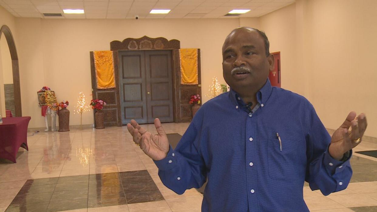 Tirupati Bolisetti is the president of the Hindu Temple and Cultural Centre of Windsor. He was planning to visit India for the first time in eight years — but with visa services to India suspended amid a dispute between Canada and India, he says he's in shock.  (TJ Dhir/CBC - image credit)