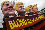 <p>A carnival float depicting, from right, Adolf Hitler, Geert Wilders, Marine Le Pen and U.S. President Donald Trump reading ‘blonde is the new brown’ is driven through the streets at the traditional carnival parade in Duesseldorf, Germany, Monday, Feb. 27, 2017. REUTERS/Wolfgang Rattay </p>